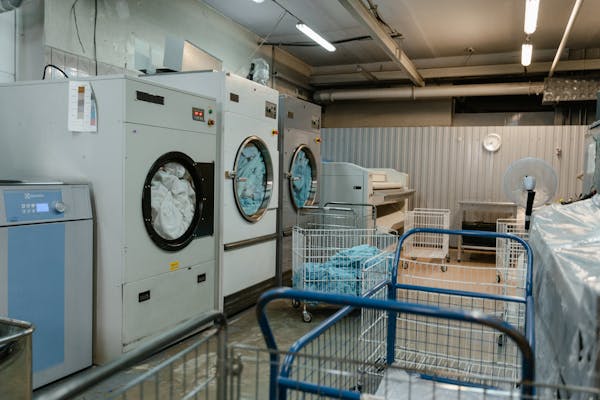 Centralized laundry processing center